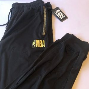 NBA Men’s black and gold warm up pants, size large.